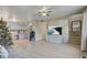 Open-concept living area connects to a kitchen and staircase at 3260 Se 32Nd Ct, Ocala, FL 34471