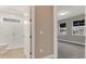 Bathroom and bedroom, with shower on the left and bedroom with two windows on the right at 1209 Cresswind Blvd, Deland, FL 32724