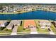 Aerial view of a home with a red tile roof, showcasing its landscaping at 4363 Summer Breeze Way, Kissimmee, FL 34744