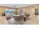 Bright living room with tile flooring, lots of natural light, and stylish furnishings at 4363 Summer Breeze Way, Kissimmee, FL 34744