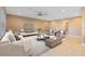 Bright living room with tile flooring, modern furnishings, and ample natural light at 4363 Summer Breeze Way, Kissimmee, FL 34744