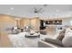 Open-concept living room with tile floors, comfortable seating, and kitchen views at 4363 Summer Breeze Way, Kissimmee, FL 34744