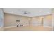 Spacious living room featuring tile flooring, ceiling fan, and neutral paint tones at 4363 Summer Breeze Way, Kissimmee, FL 34744