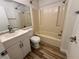 Small bathroom with a vanity, toilet, and a shower/tub combo with tile surround at 1234 Sago Palm Blvd # 1234, Kissimmee, FL 34741