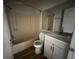 Bathroom featuring a tub and shower combination, a toilet, and modern vanity at 1234 Sago Palm Blvd # 1234, Kissimmee, FL 34741