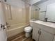 Well-lit bathroom featuring a tub and shower combination and modern vanity with a sink at 1234 Sago Palm Blvd # 1234, Kissimmee, FL 34741