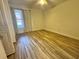 Cozy bedroom with tile floors, ceiling fan, and natural light from the window at 1234 Sago Palm Blvd # 1234, Kissimmee, FL 34741