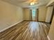 Bedroom with tile floors, ceiling fan, and natural light from the window at 1234 Sago Palm Blvd # 1234, Kissimmee, FL 34741