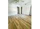 Spacious bedroom with two closets, ceiling fan, and wood-look floors at 1234 Sago Palm Blvd # 1234, Kissimmee, FL 34741