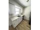 Bright kitchen showcasing white cabinets, stainless appliances, and quartz countertops at 1234 Sago Palm Blvd # 1234, Kissimmee, FL 34741