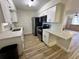 Modern kitchen featuring quartz countertops, stainless steel appliances, and tile floors at 1234 Sago Palm Blvd # 1234, Kissimmee, FL 34741