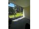 Screened patio provides a bug-free outdoor living space overlooking a green yard at 1234 Sago Palm Blvd # 1234, Kissimmee, FL 34741