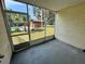 Relaxing screened patio offering a view of the pool, back yard, and storage shed at 1234 Sago Palm Blvd # 1234, Kissimmee, FL 34741
