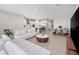 Spacious open-concept floor plan features a modern kitchen, dining area, and comfortable living room at 13333 Oakenshaw Ln, Orlando, FL 32832