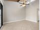 Bright living room with tile floors, ceiling fan and sliding glass doors at 5929 Windhover Dr # A02, Orlando, FL 32819