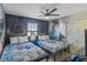 Themed bedroom with Star Wars wall art and two beds at 1574 Slice Way, Davenport, FL 33896