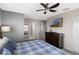 Bedroom with dresser and TV at 1574 Slice Way, Davenport, FL 33896