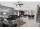 Open concept living space combining the living room, kitchen, and dining area for seamless living at 1574 Slice Way, Davenport, FL 33896