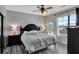 Main bedroom with king bed and private balcony access at 904 Charo Pkwy # 536, Davenport, FL 33897