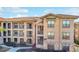 Two-story residential building with stone and stucco exterior at 904 Charo Pkwy # 536, Davenport, FL 33897