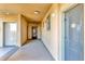 Building hallway with elevator access and apartment doors at 904 Charo Pkwy # 536, Davenport, FL 33897