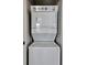 Stackable washer and dryer in convenient laundry closet at 904 Charo Pkwy # 536, Davenport, FL 33897