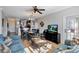 Open living room, dining, and kitchen area at 904 Charo Pkwy # 536, Davenport, FL 33897