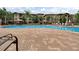 Resort-style pool with lounge chairs at 904 Charo Pkwy # 536, Davenport, FL 33897