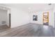 Bright living room with hardwood floors and large window at 2416 Sw 158Th Pl, Ocala, FL 34473