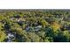 House nestled amongst lush trees in a residential neighborhood at 400 Raehn St, Orlando, FL 32806