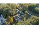 Mid-century modern home viewed from above. Shows front yard and street at 400 Raehn St, Orlando, FL 32806