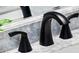Modern bathroom sink with sleek black faucet and white vanity at 400 Raehn St, Orlando, FL 32806