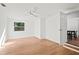 Bright bedroom with light hardwood floors and ceiling fan at 400 Raehn St, Orlando, FL 32806