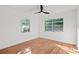 Spacious bedroom with hardwood floors and large windows at 400 Raehn St, Orlando, FL 32806