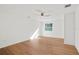 Spacious bedroom featuring hardwood floors and a large window at 400 Raehn St, Orlando, FL 32806