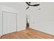 Light and airy bedroom with hardwood floors and white walls at 400 Raehn St, Orlando, FL 32806