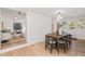 Light and bright dining room with hardwood floors at 400 Raehn St, Orlando, FL 32806