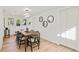 Modern dining room with hardwood floors and white walls at 400 Raehn St, Orlando, FL 32806