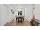 Dining room with hardwood floors and access to backyard at 400 Raehn St, Orlando, FL 32806