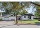Updated home with a detached garage and stone accent wall at 400 Raehn St, Orlando, FL 32806