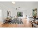 Bright and airy living room with hardwood floors and modern decor at 400 Raehn St, Orlando, FL 32806