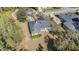 Aerial view of house and surrounding backyard at 6689 Bell Glade Pl, Sanford, FL 32771