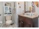 Clean and functional bathroom with a vanity and toilet at 6689 Bell Glade Pl, Sanford, FL 32771