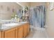 Clean bathroom with double sinks and a shower/tub combo at 6689 Bell Glade Pl, Sanford, FL 32771