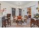 Charming dining area with a rustic table and comfortable seating at 6689 Bell Glade Pl, Sanford, FL 32771