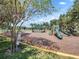 Playground with slides, a gazebo, and soft ground cover offers a safe and enjoyable recreational area for children at 7321 Brightland St, Windermere, FL 34786