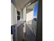 This view looks out to a balcony with white railings at 1210 Southstation Pl # 303, Orlando, FL 32809