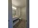 Clean bathroom with a modern vanity, tile floors, and a shower-tub combination at 1210 Southstation Pl # 303, Orlando, FL 32809