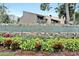 Cypress Woods community entrance sign with landscaping at 5316 Pebble Beach Dr # E, Orlando, FL 32811