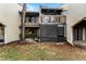 Back exterior view with private screened-in patio and deck at 5316 Pebble Beach Dr # E, Orlando, FL 32811